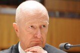 Mr Stevens says the RBA board decided to review the use of overseas agents in April 2006 because of the wheat-for-weapons scandal.