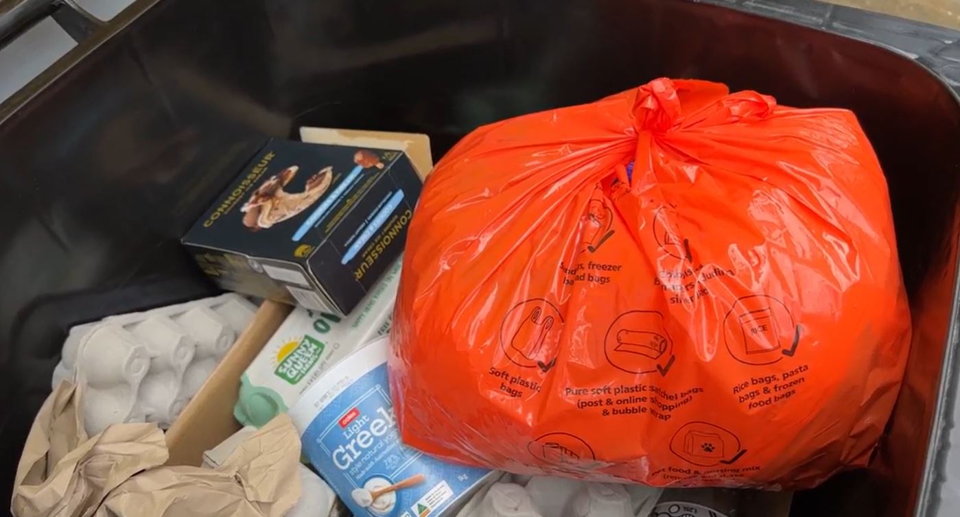 orange bag full of soft plastics as part of a recycling trial led by macedon ranges shire council