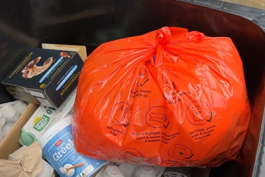 orange bag full of soft plastics as part of a recycling trial led by macedon ranges shire council