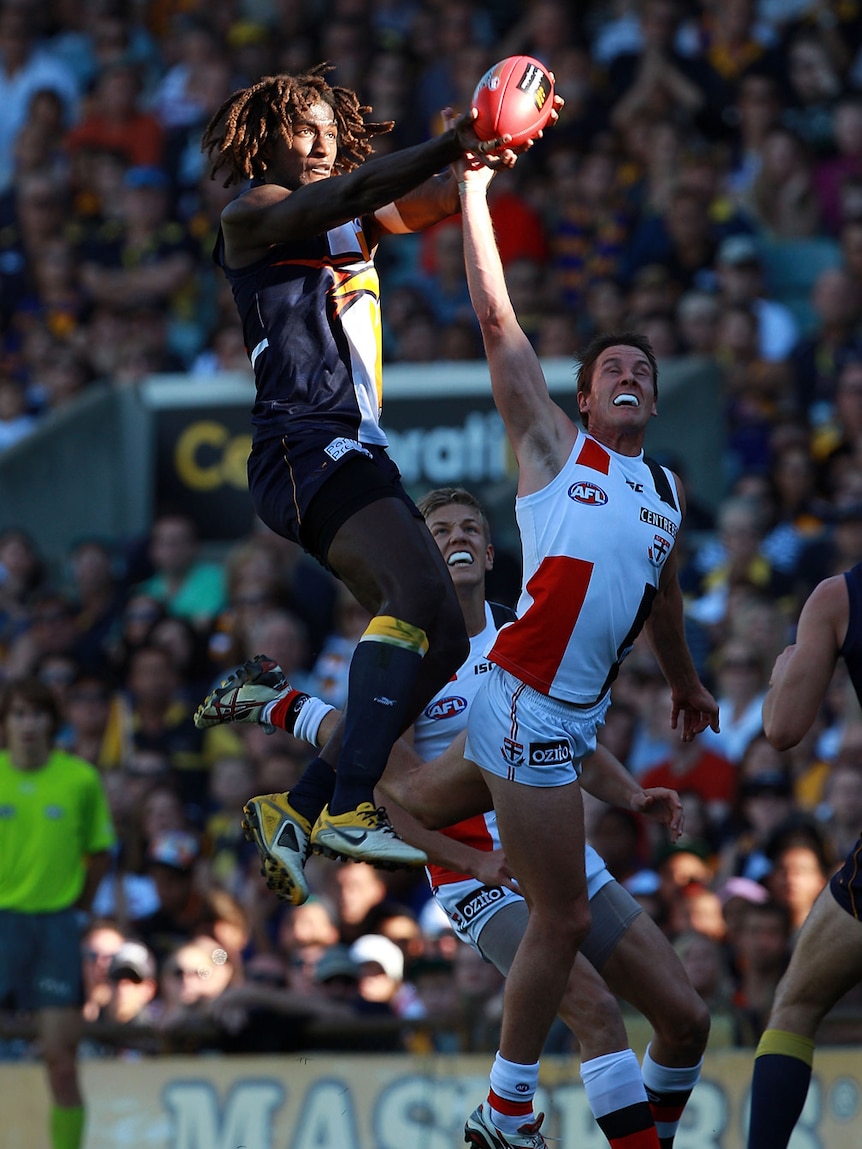Eagles' high flier Nic Naitanui goes up for another speccie.