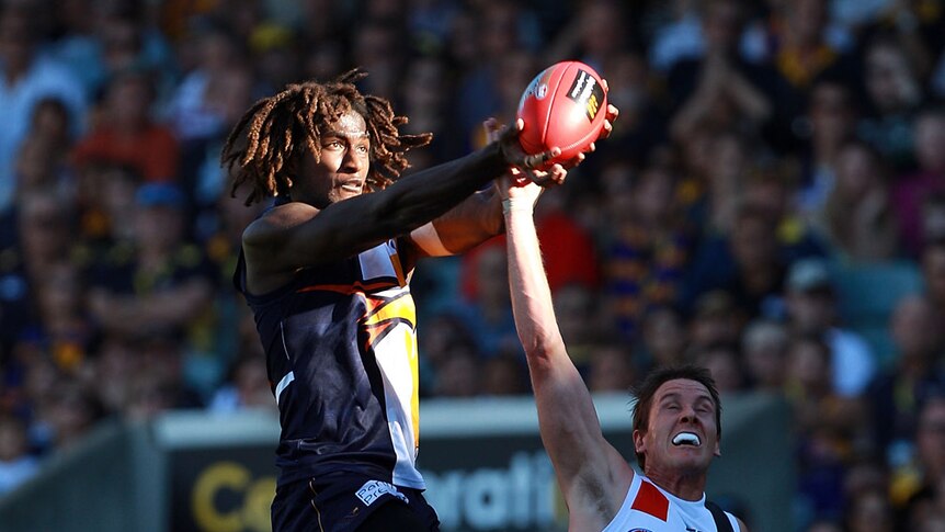 Eagles' high flier Nic Naitanui goes up for another speccie.