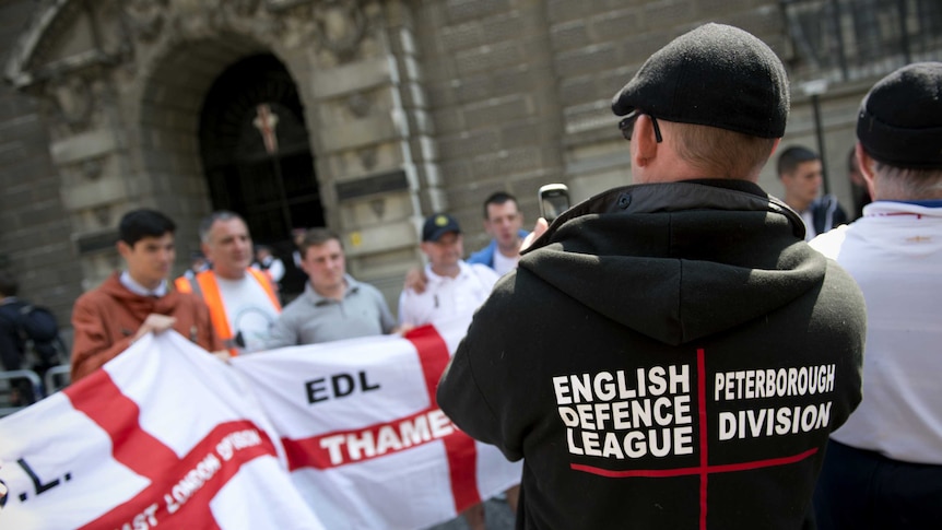 English Defence League members rally outside court