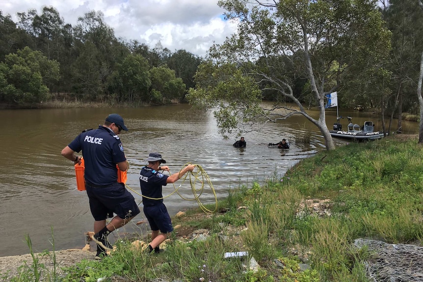 Police search the Pimpama River on the Gold Coast for Tiahleigh Palmer's body.