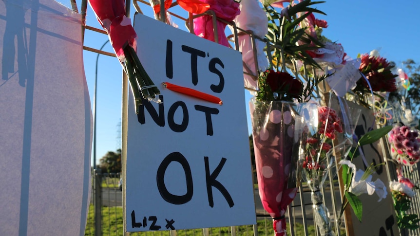 Flowers and messages at site of Olga Neubert's murder
