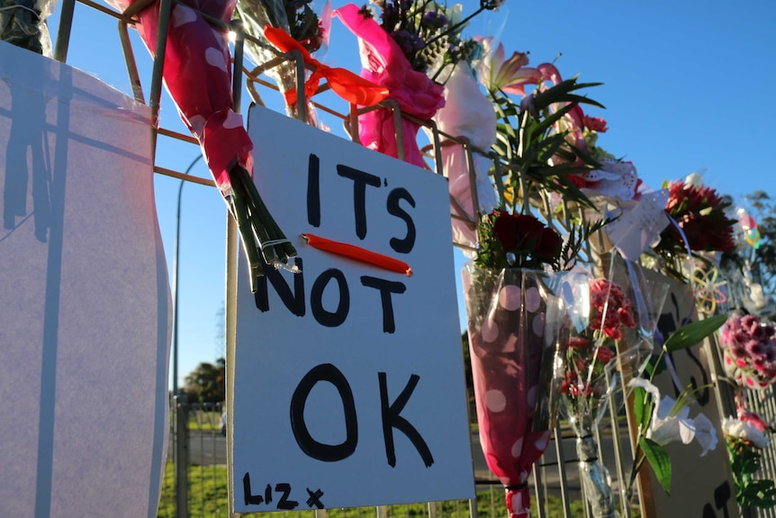 Flowers and messages at site of Olga Neubert's murder