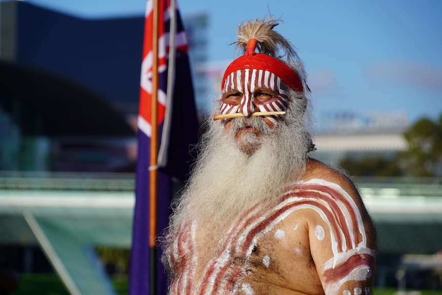 A participant in an Aboriginal smoking ceremony in Adelaide.