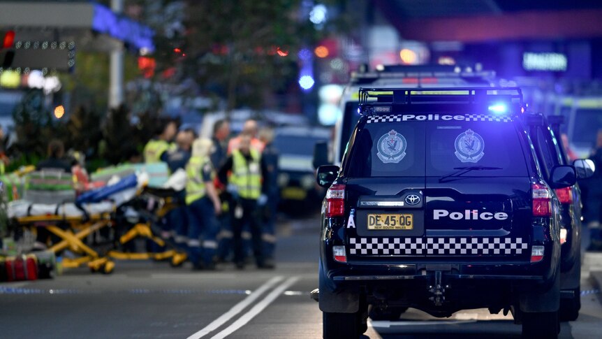 Police and emergency services are seen at Bondi Junction
