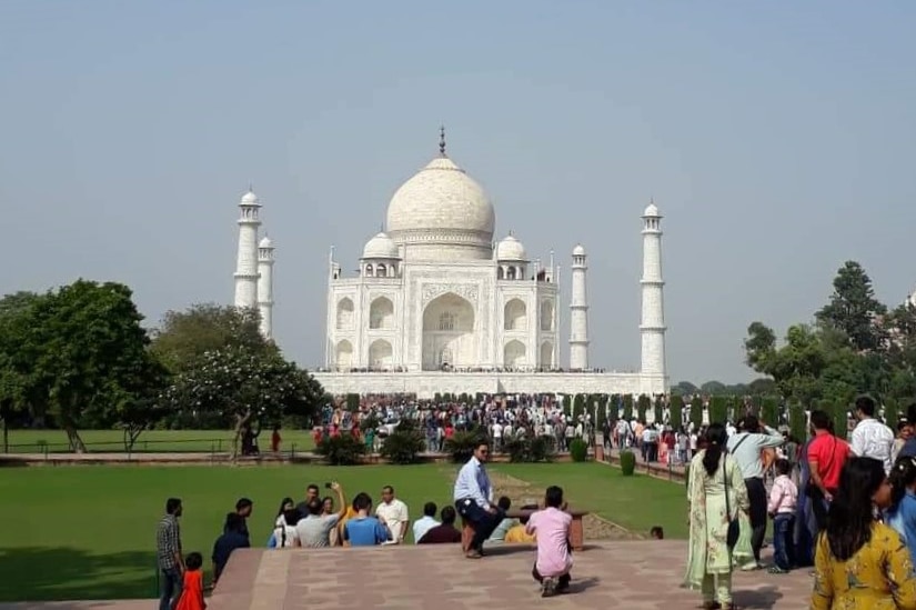 Taj Mahal full of tourists in Agra.