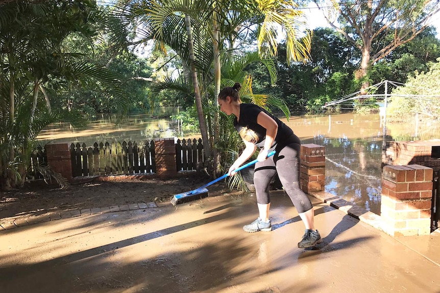 Caroline cleans up at her house at Waterford West at Logan