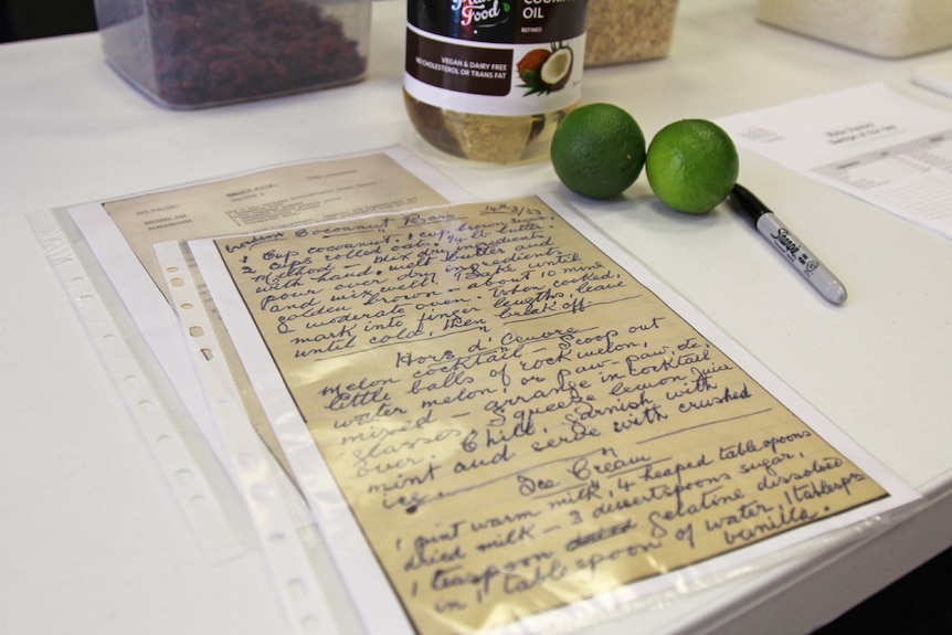 Old recipes on brown paper with cursive writing.