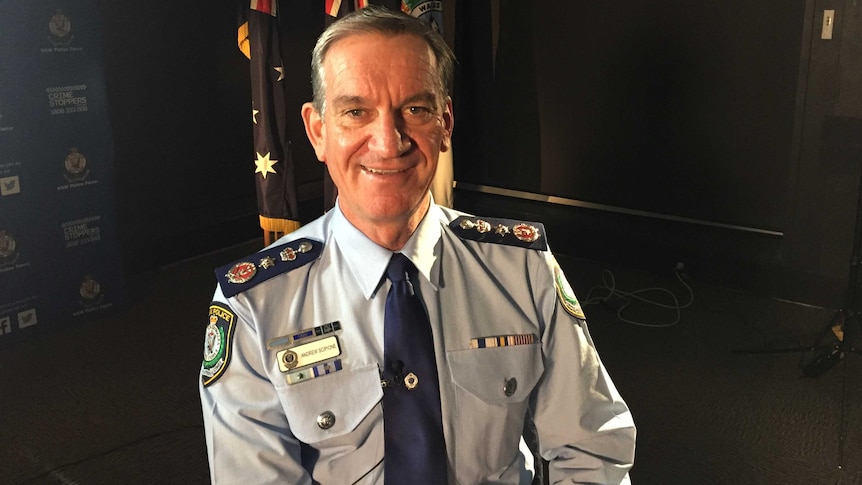 Commissioner Andrew Scipione sits in his uniform.