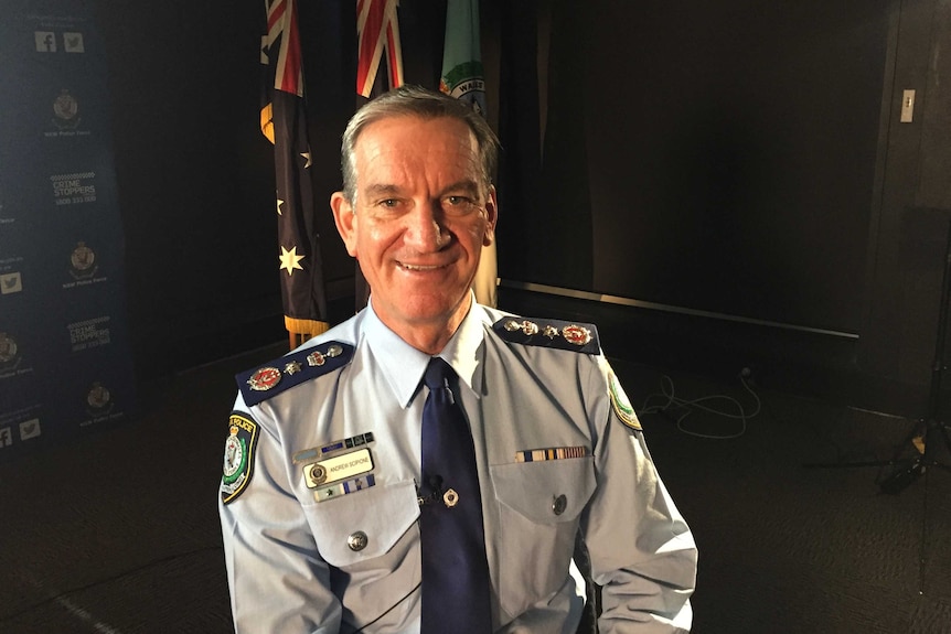 Commissioner Andrew Scipione sits in his uniform.