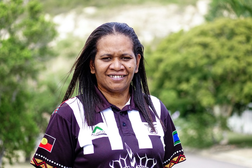 A portrait of Nicole Ross, president of the Garbutt Magpies Junior Football Club in Townsville.