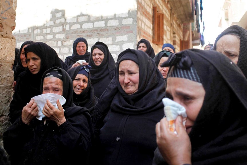 Grief after murder of Coptic men