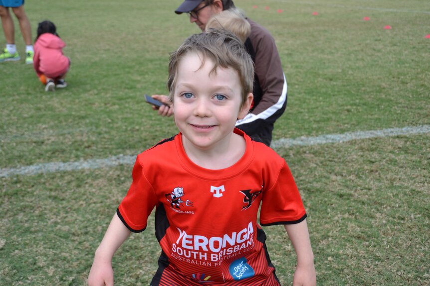 Asher O'Keeffe, 4, at Auslan Aussie rules at Yeronga South Brisbane Devils AFL club