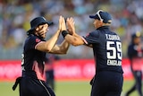 England's Tom Curran (R) and David Willey celebrate the dismissal of Australia's Marcus Stoinis.