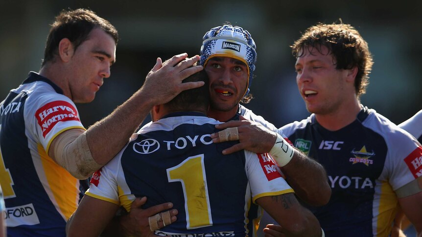 Bowen is congratulated by his Cowboys team-mates