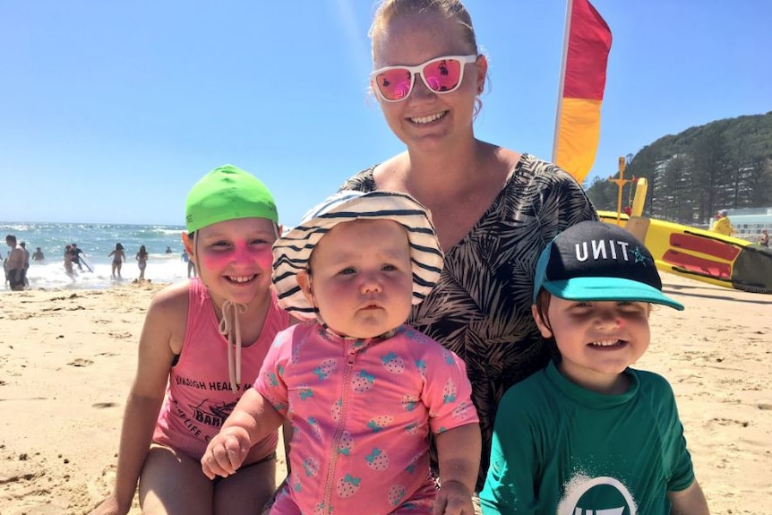 The Bernklev family build sandcastles at Burleigh