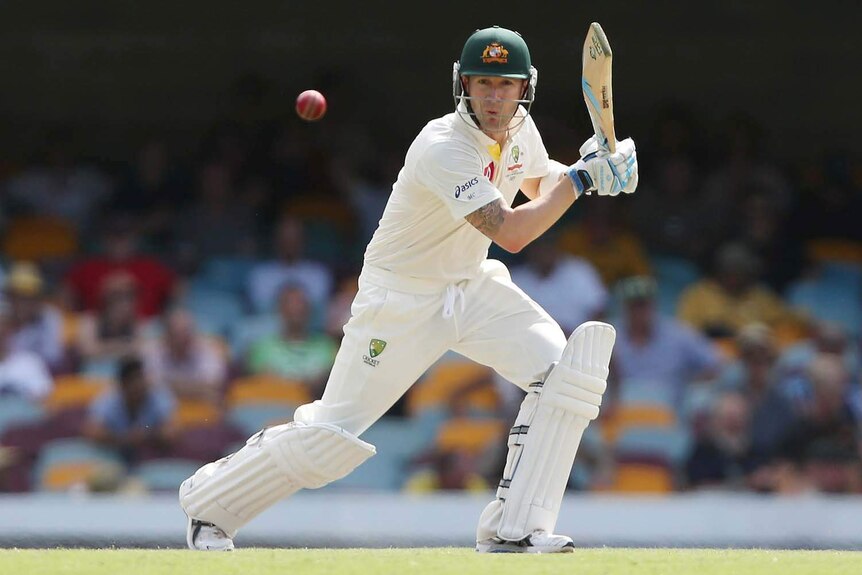 Cop that... Michael Clarke cover drives on day four at the Gabba.