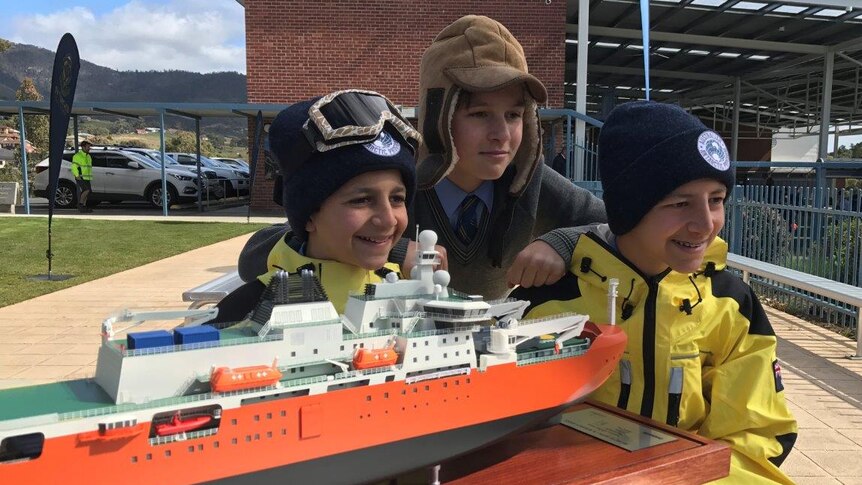 St Vigils students with a model of Australia's new icebreaker