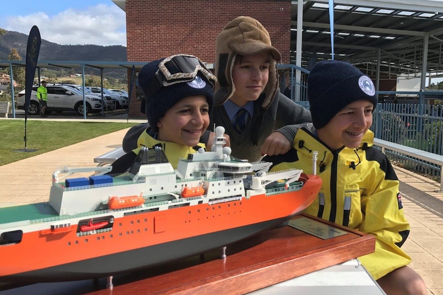 St Vigils students with a model of Australia's new icebreaker
