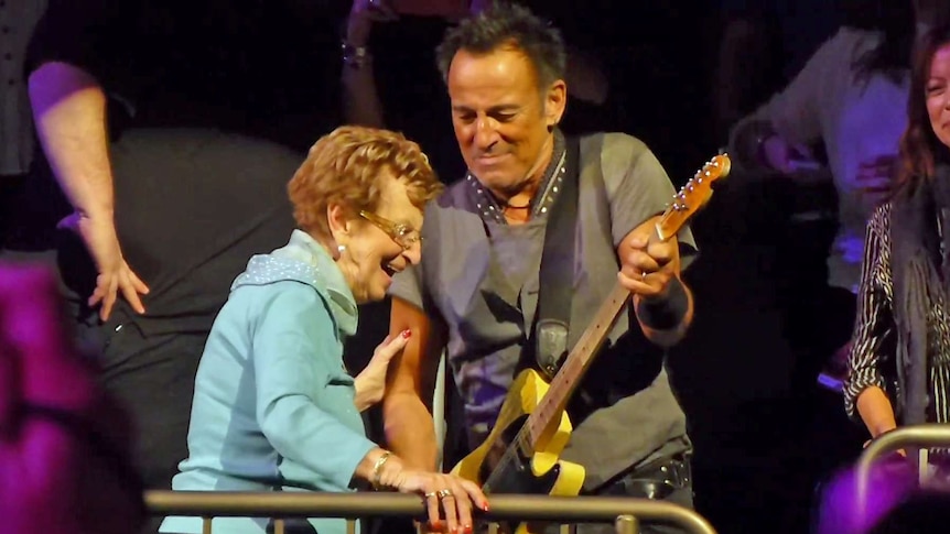 Bruce Springsteen joins his Mum in the crowd for a dance