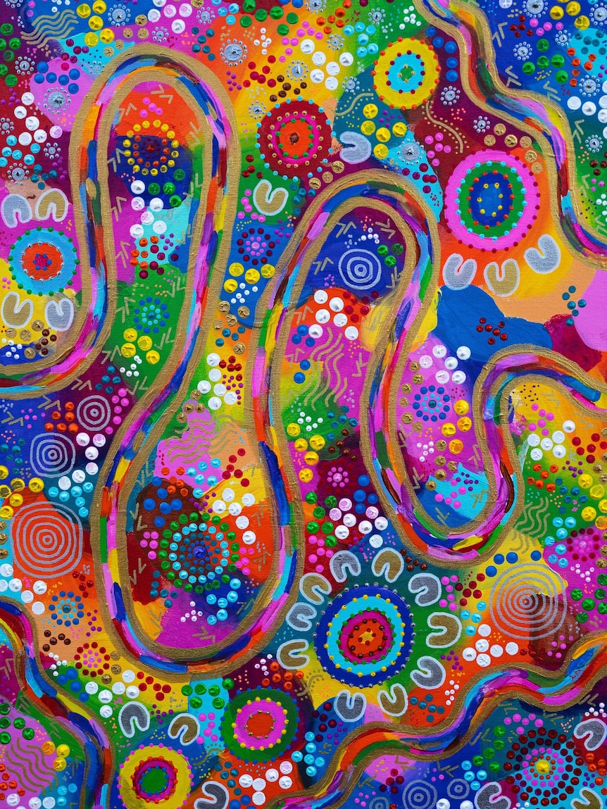 a brightly painted Indigenous artwork