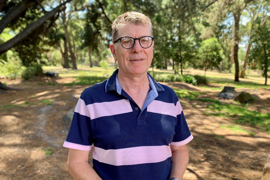 Man stands in park