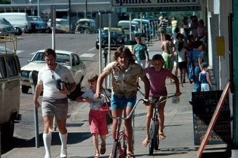 Children ride their bikes in the CBD of Mount Isa in this historical photograph taken in 1978. 