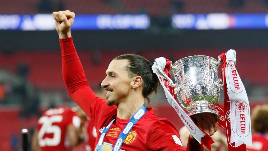Manchester United's Zlatan Ibrahimovic with trophy after League Cup final against Southampton.