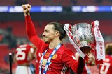 Manchester United's Zlatan Ibrahimovic with trophy after League Cup final against Southampton.