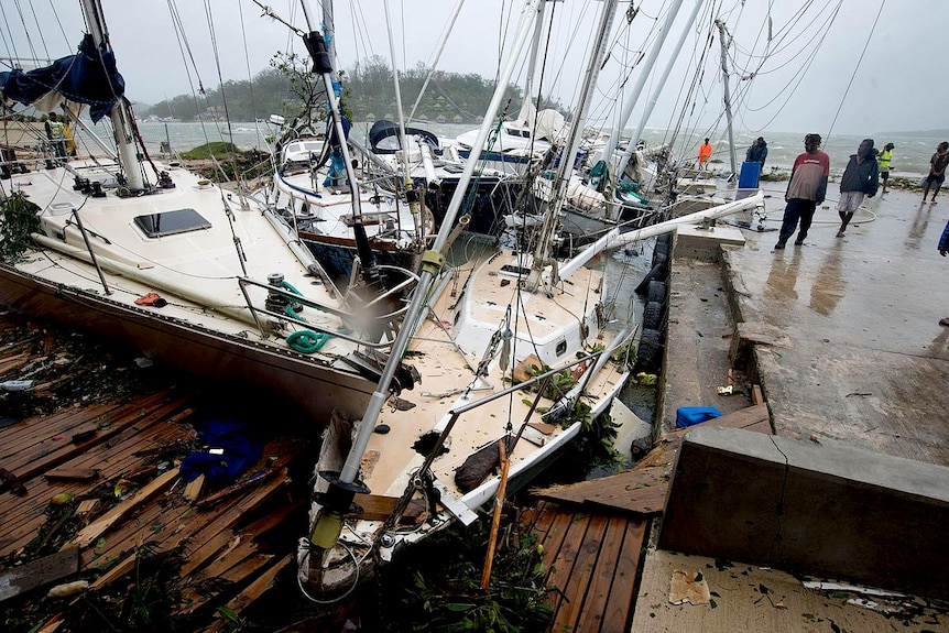 Damaged yachts in Port Vila harbour immediately after Cyclone Pam