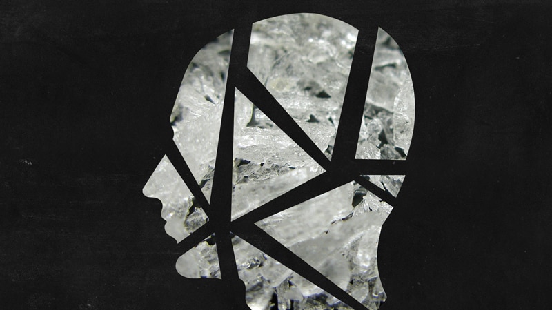 A graphically altered silhouette of a man's head over the drug ice.