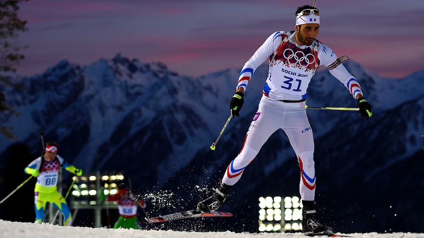 Fourcade trudges to biathlon 20km individual gold