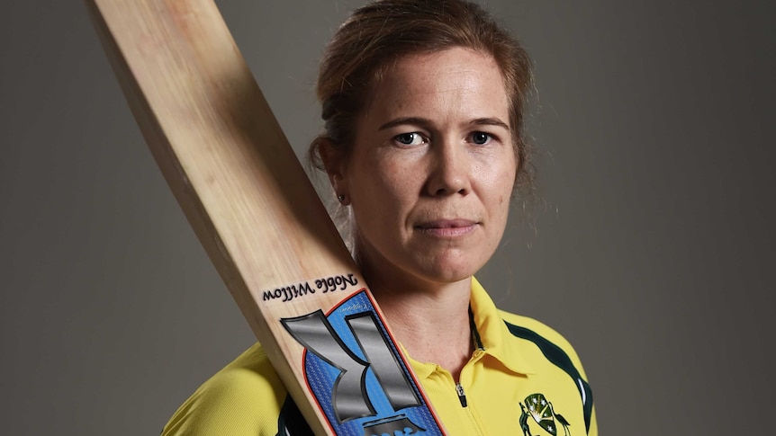 portrait of cricketer Alex Blackwell holding a bat