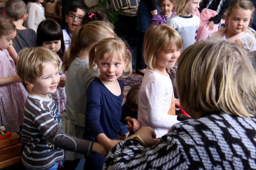 Children meeting with nursing home residents