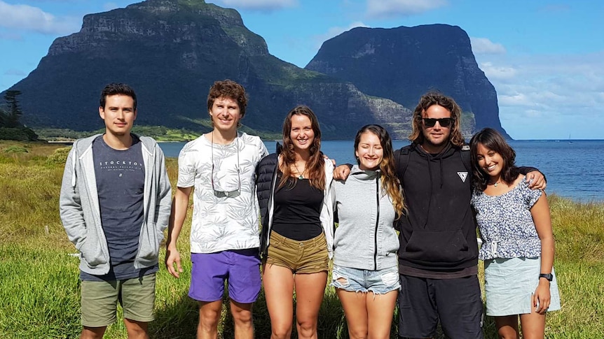 Some of the international backpackers who remain on the world heritage-listed Lord Howe Island.
