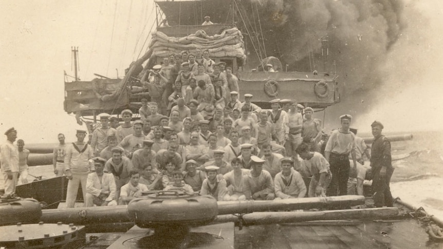 Crew of ship on deck