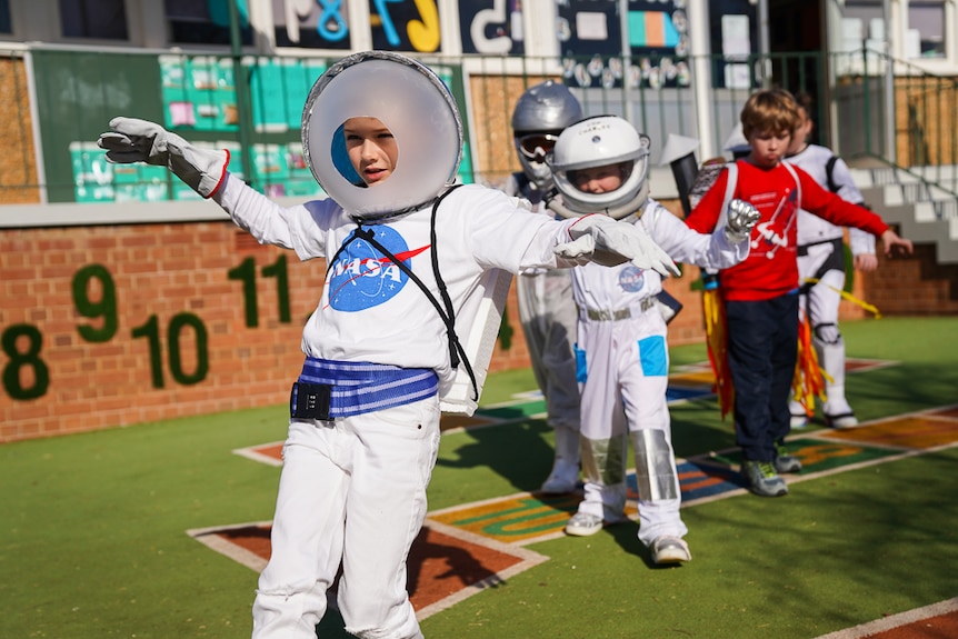 Parkes primary school students walking in space outfits