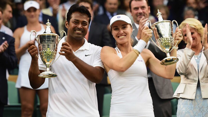 Martina Hingis and Leander Paes celebrate Wimbledon mixed doubles title