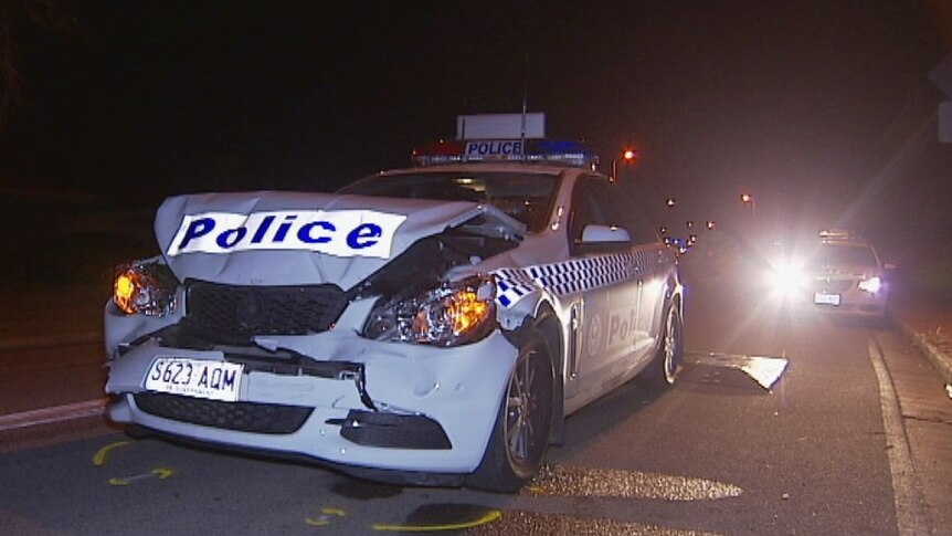A police car was badly damaged