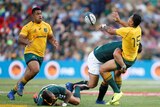 South Africa's Malcolm Marx challenges Australia's Israel Folau.