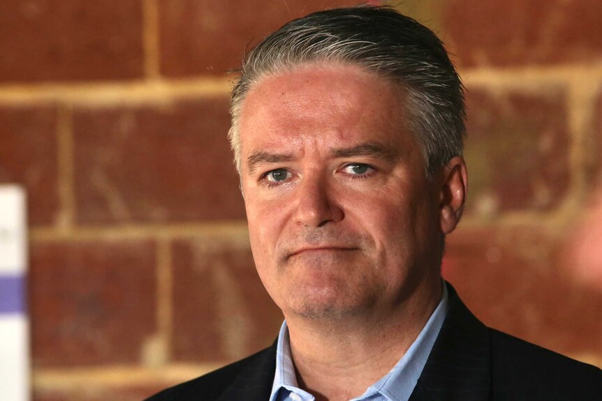 Federal Finance Minister Mathias Cormann on a building site in Perth, WA.