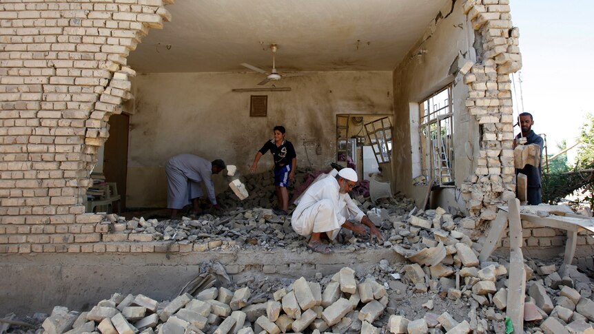 Taji residents at site of bomb attack