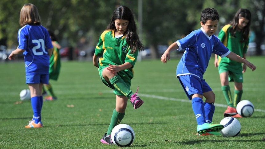 Children play soccer at Gosch's Paddock in Melbourne.