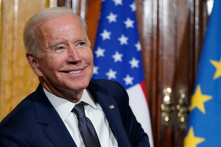 A close up of Joe Biden smiling.