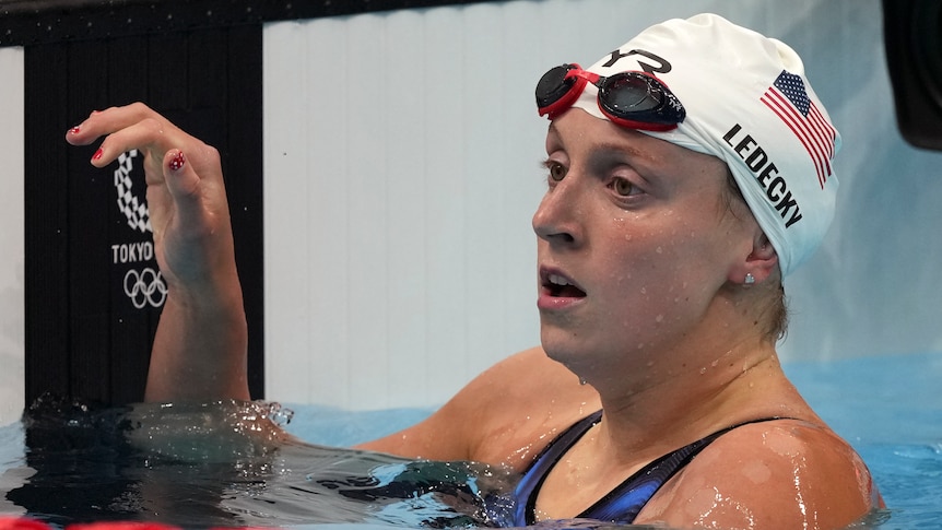 Katie Ledecky is at the end of the pool after her 200 metres freestyle 