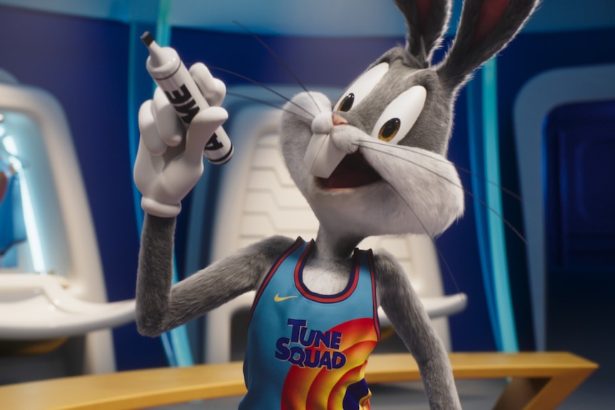 An animated Bugs Bunny in a basketball uniform is holding a permanent marker in his hand with his mouth open mid-sentence