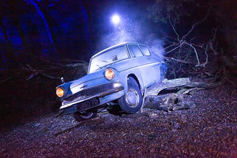 A prop car in a forest