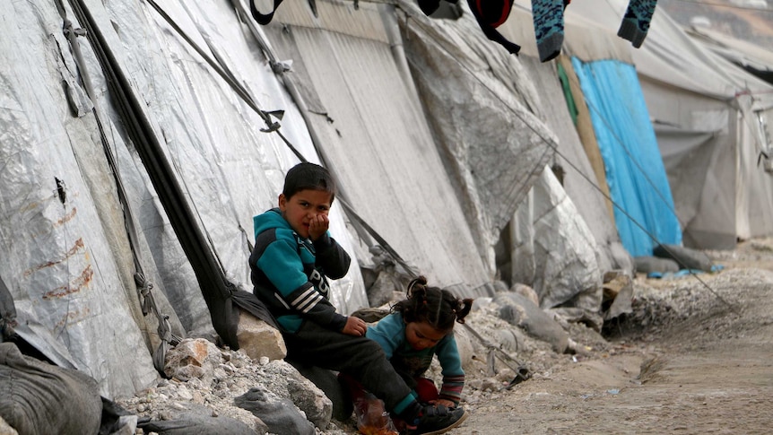 Children outside their tents in the refugee camps of Syria.